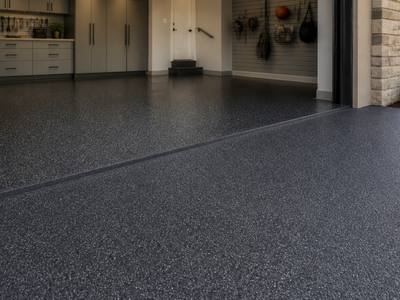 Two-car garage floor finished in charcoal rubber surfacing